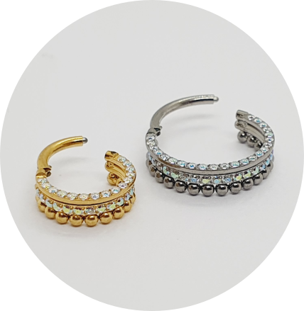 Segmento Articulado Zircônias Cravejadas Furta-cor Lateral e Frontal com esferas - Natural e PVD Gold
